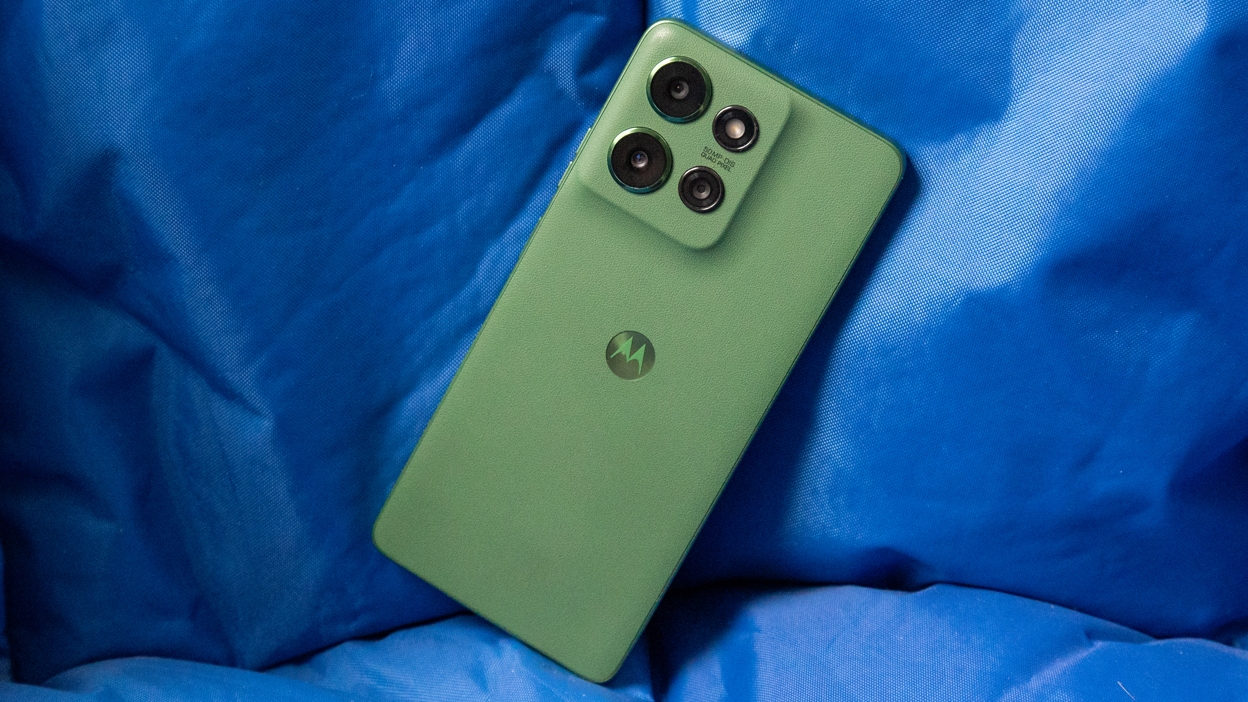 The Moto G Power 2025 against a blue background