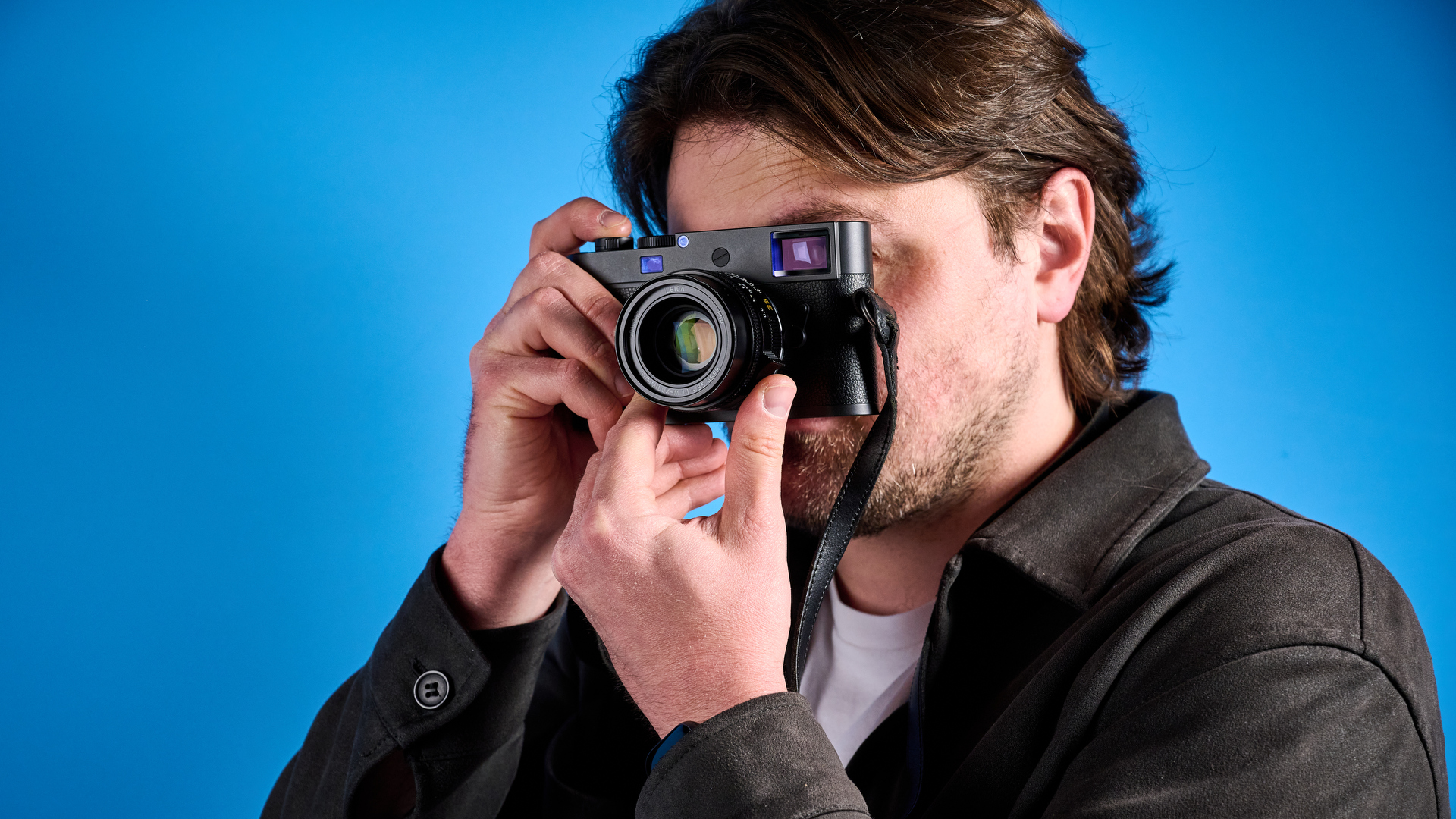 A black Leica M11-D rangefinder camera