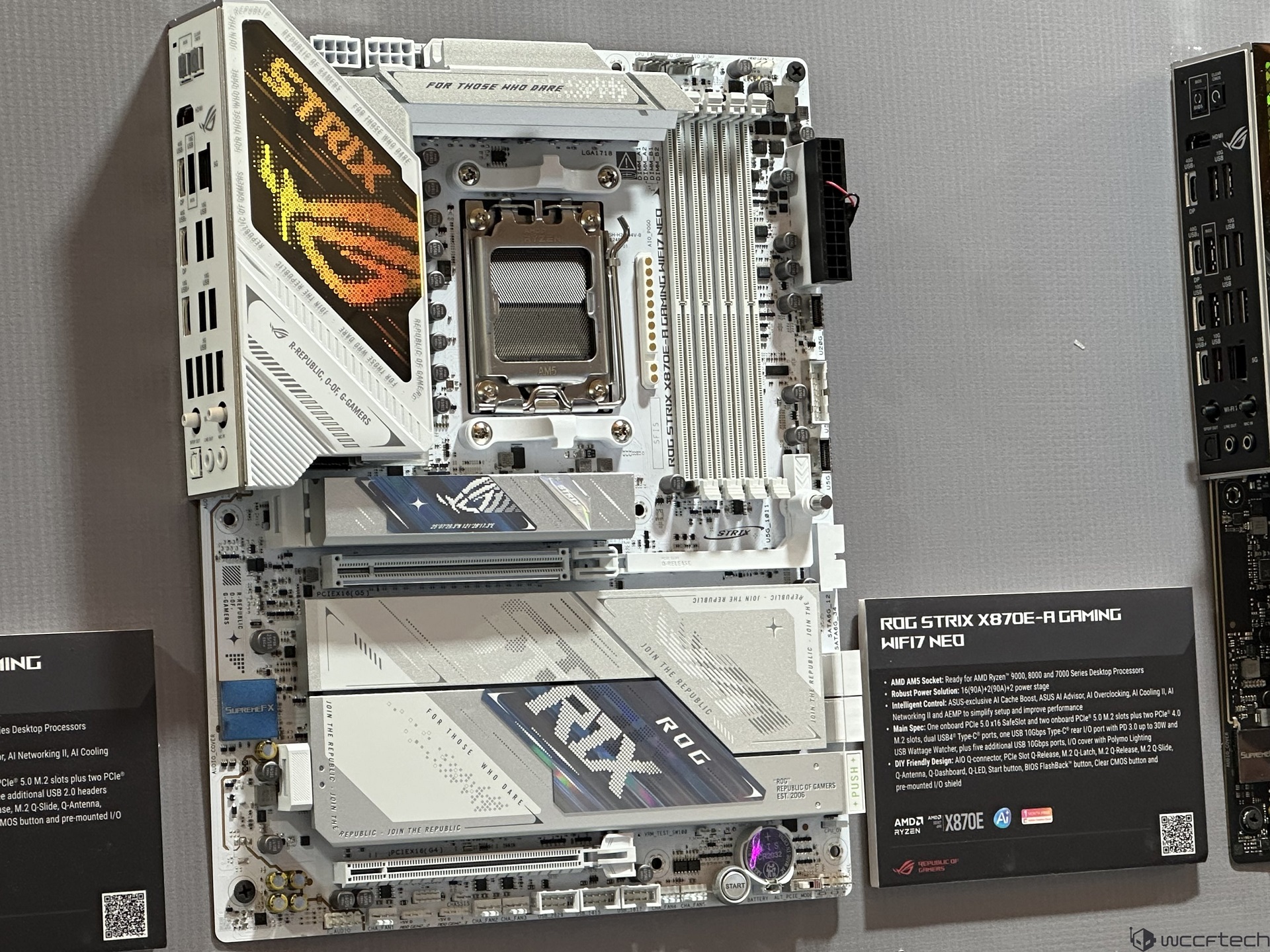 The image shows the ASUS ROG STRIX X670E-A GAMING WIFI 7 NEO motherboard with an AMD AM5 socket, featuring branded elements from ASUS Republic of Gamers and an information card detailing socket and power solutions.