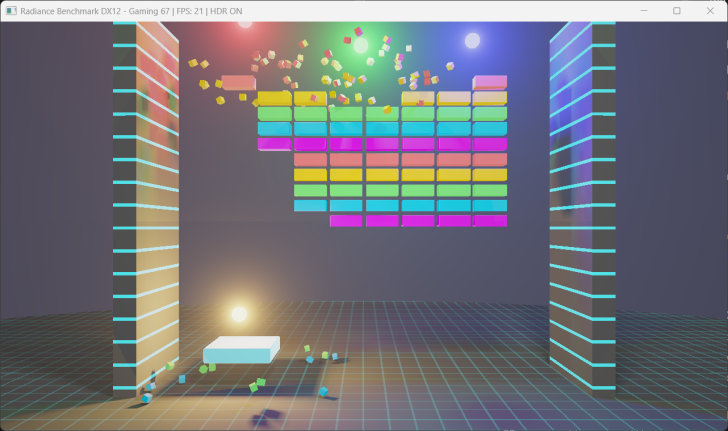 Ένα στιγμιότυπο οθόνης του 'Radiance Benchmark DX12' που δείχνει ένα πολύχρωμο παιχνίδι που ξεπερνά τα μπλοκ με το 'Gaming 67 | FPS: 21 | HDR ON' εμφανίζεται στο επάνω μέρος.
