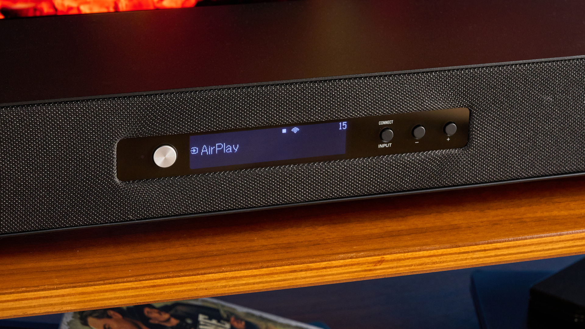 the yamaha true x surround 90a soundbar with dolby atmos, subwoofer, surround rear wireless speakers, and a 5.1.4 channel configuration photographed alongside a TV