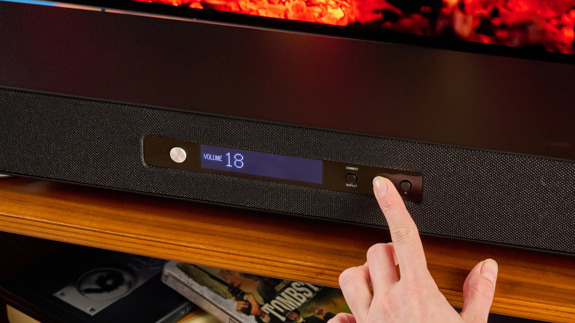 the yamaha true x surround 90a soundbar with dolby atmos, subwoofer, surround rear wireless speakers, and a 5.1.4 channel configuration photographed alongside a TV