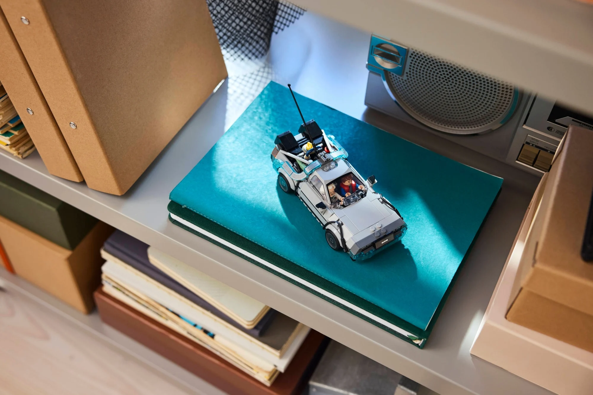 Lego Time Machine from Back to the Future on bookshelf