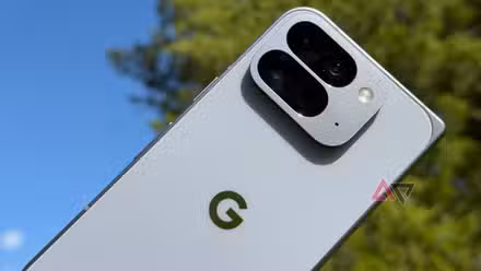 Google Pixel 10 Pro Fold held up against the sky in sunlight