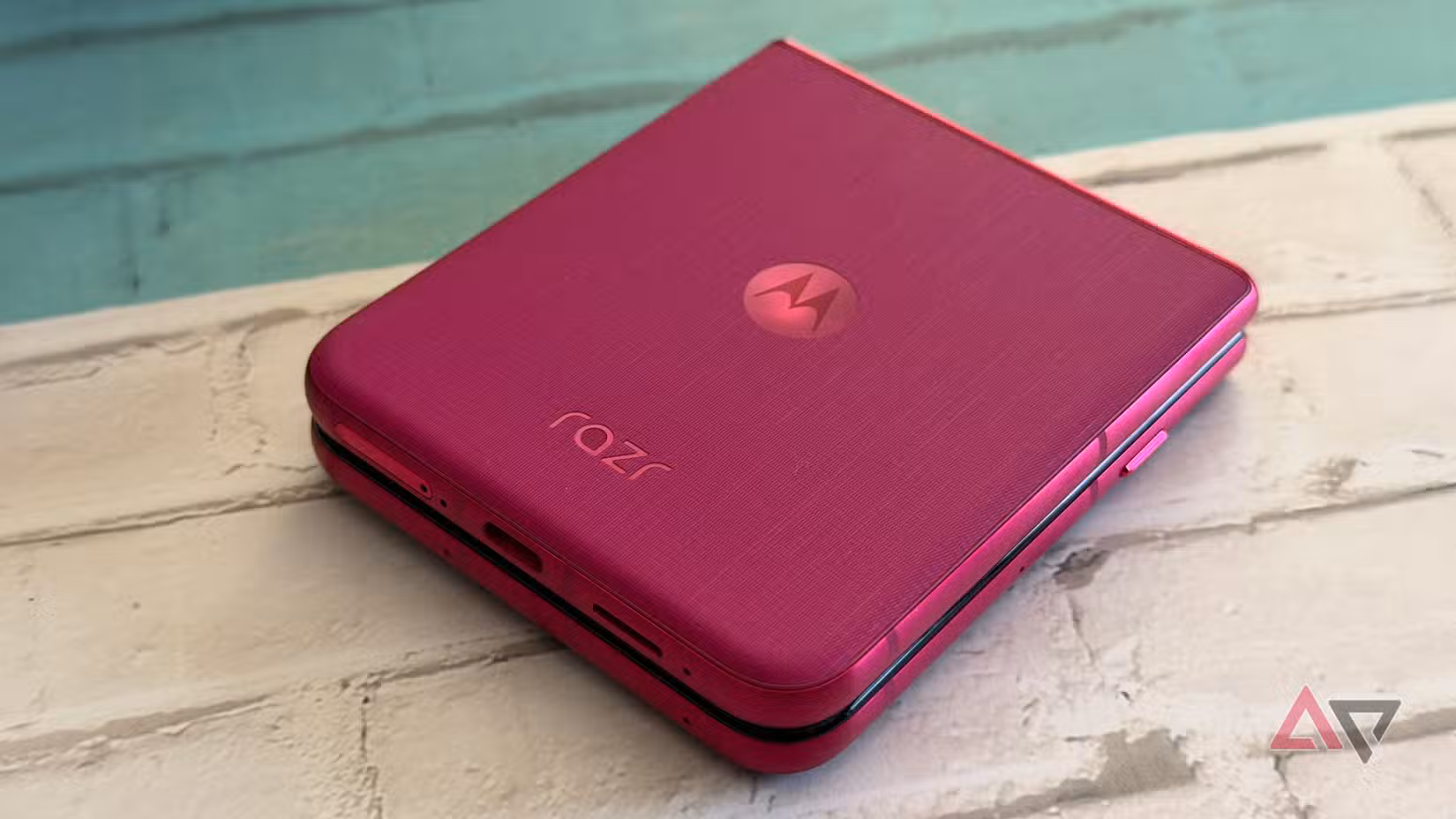 Motorola Razr Ultra 2025 in Pink Cabaret sitting on desk