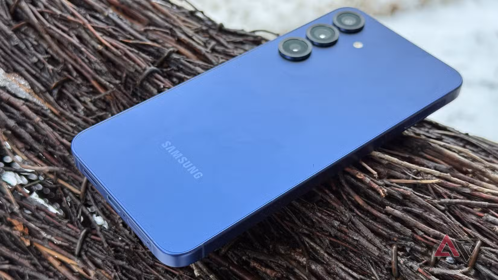 Samsung Galaxy S25+ sitting on back of wooden deer